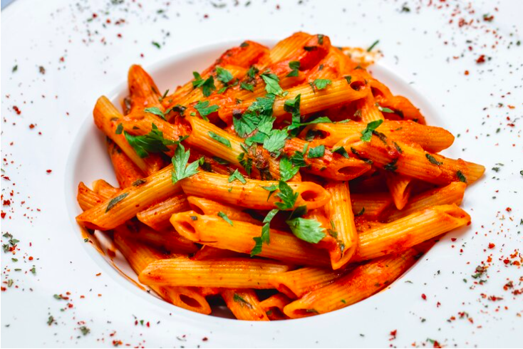 Penne Pomodoro Penne pasta in a rich tomato sauce with fresh basil and garlic.
